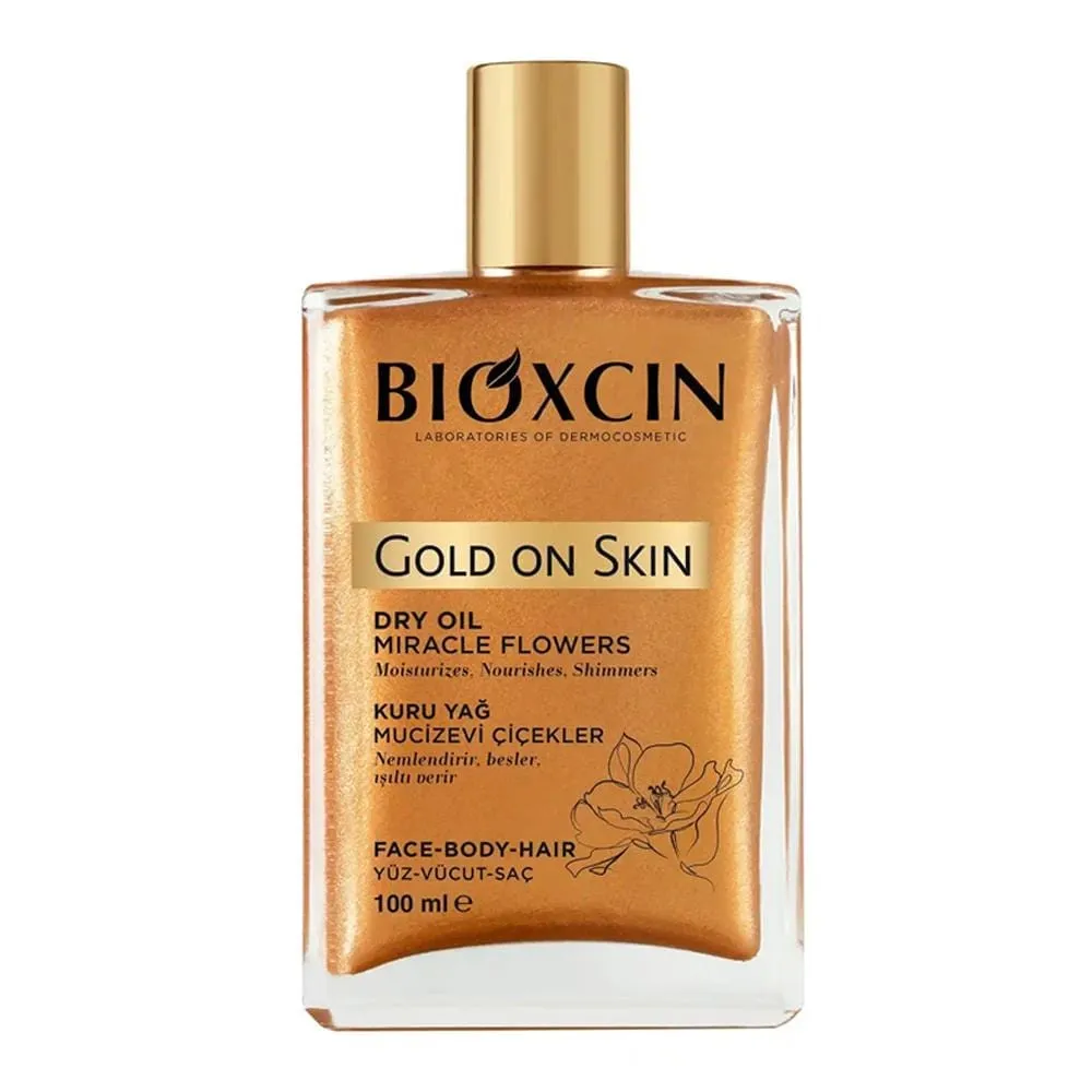 روغن شاین‌دار صورت، بدن و مو بیوکسین مدل Gold On Skin حجم ۱۰۰ میلی‌لیتر | روغن خشک چندمنظوره با درخشندگی طلایی و آبرسانی عمیق