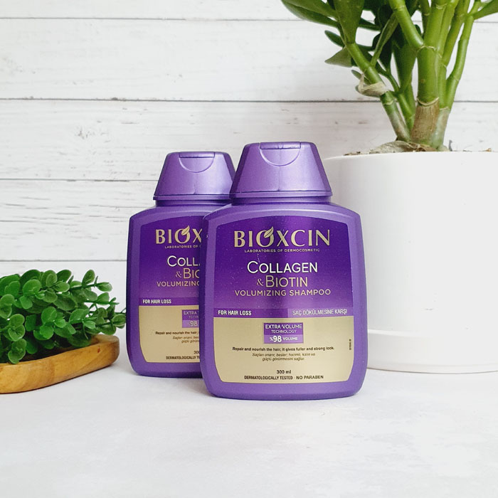 شامپو بیوکسین بنفش بیوتین کلاژن Bioxcin